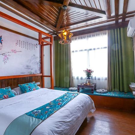 Bugu Hostel Wulingyuan Buitenkant foto