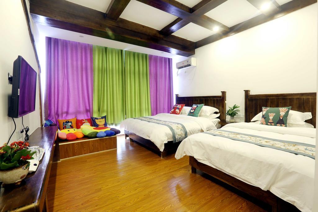 Bugu Hostel Wulingyuan Buitenkant foto