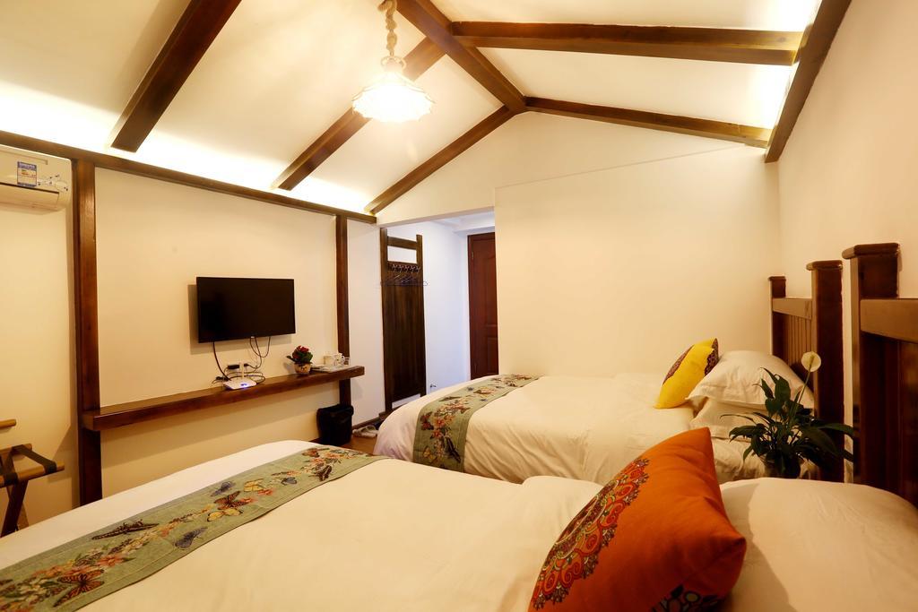 Bugu Hostel Wulingyuan Buitenkant foto