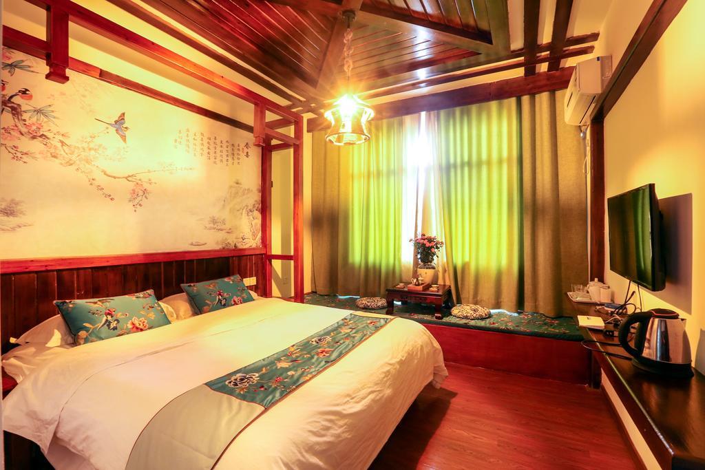 Bugu Hostel Wulingyuan Buitenkant foto